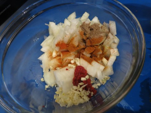 Onion and spices, prior to going into the microwave for the first time.