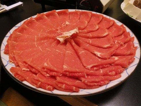 Incredibly thinly sliced beef.