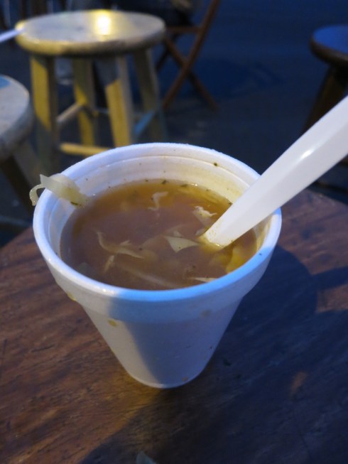 Fish soup.  You can't see them, but there are lots of fish pieces hanging out at the bottom of the cup.