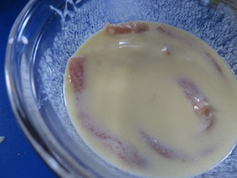 Chicken tenders, just hanging out in the buttermilk/egg mixture.