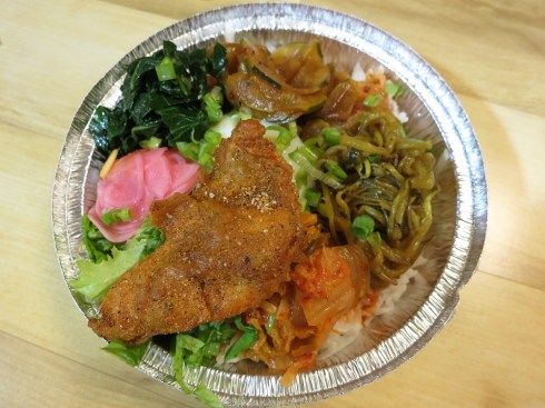 Rice bowl with 21 Spice Fried Chicken.